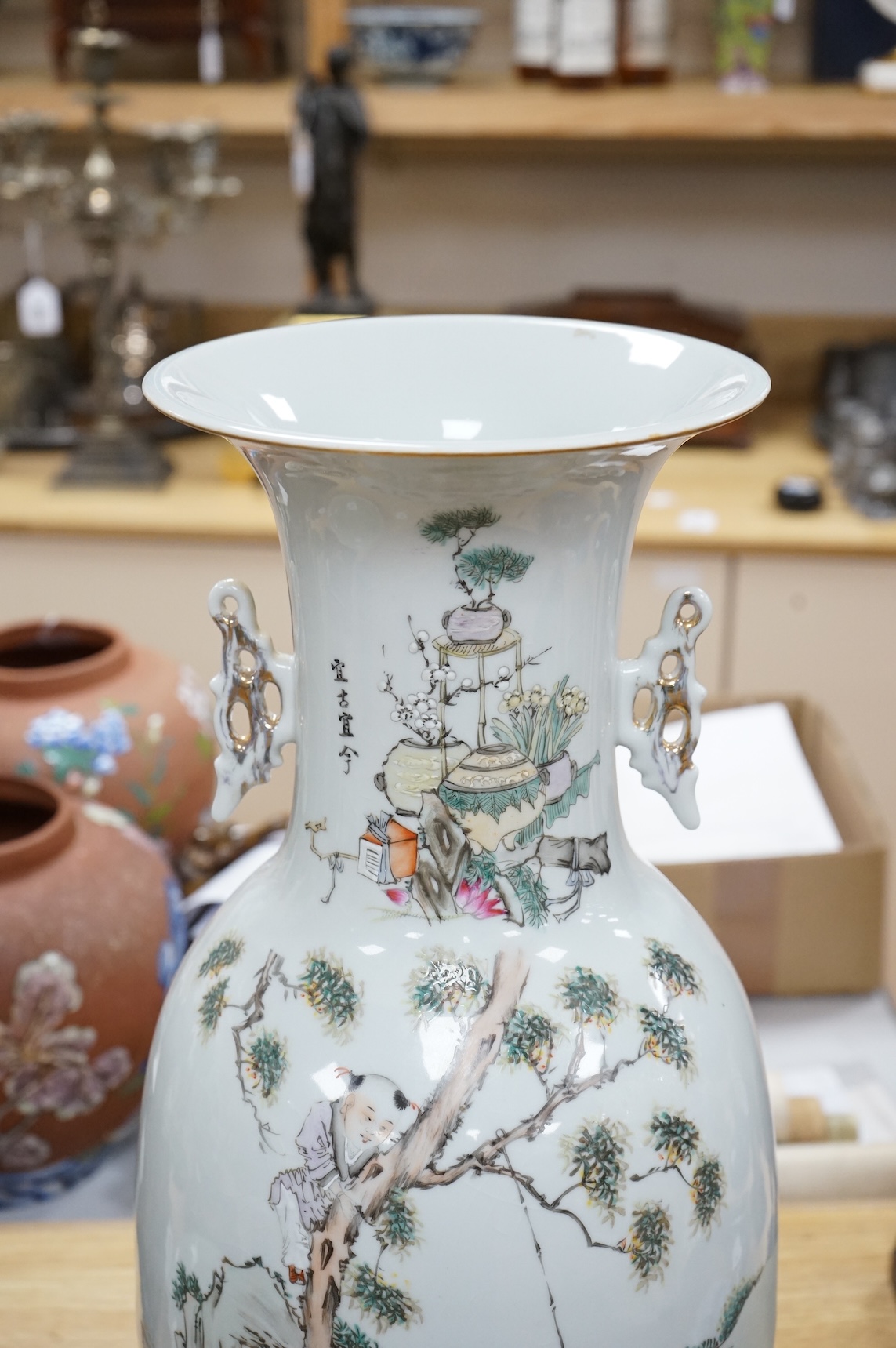 A large Chinese famille rose figural vase, 57cm high